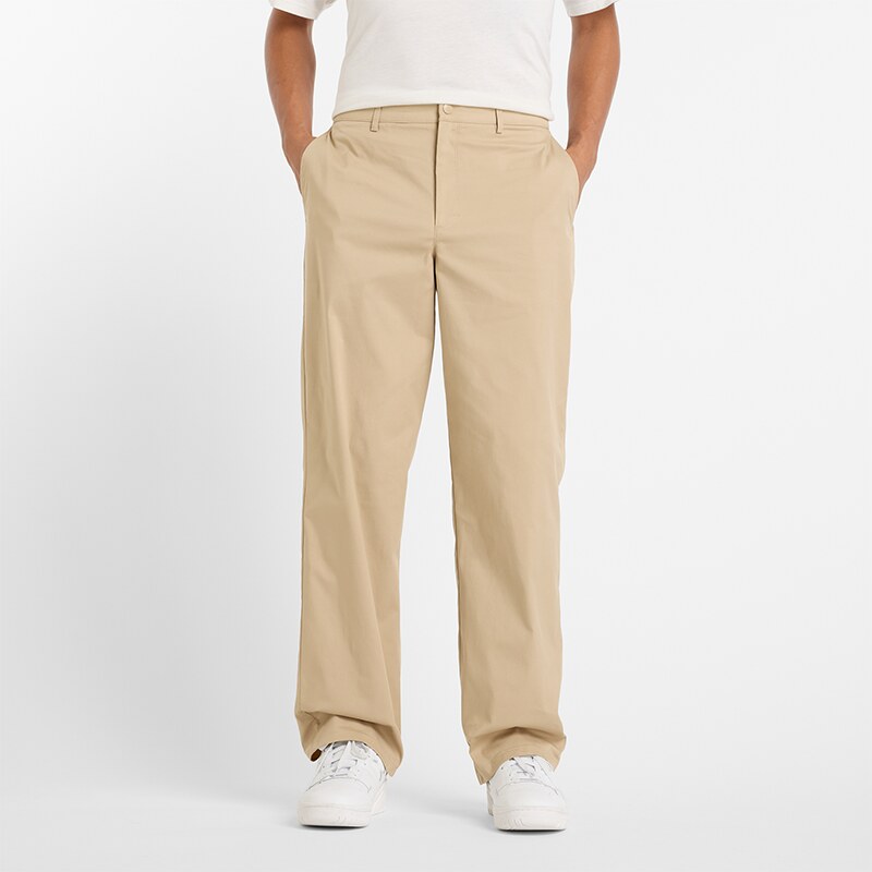 Pánske nohavice New Balance MP43560SOT – béžové 57378894