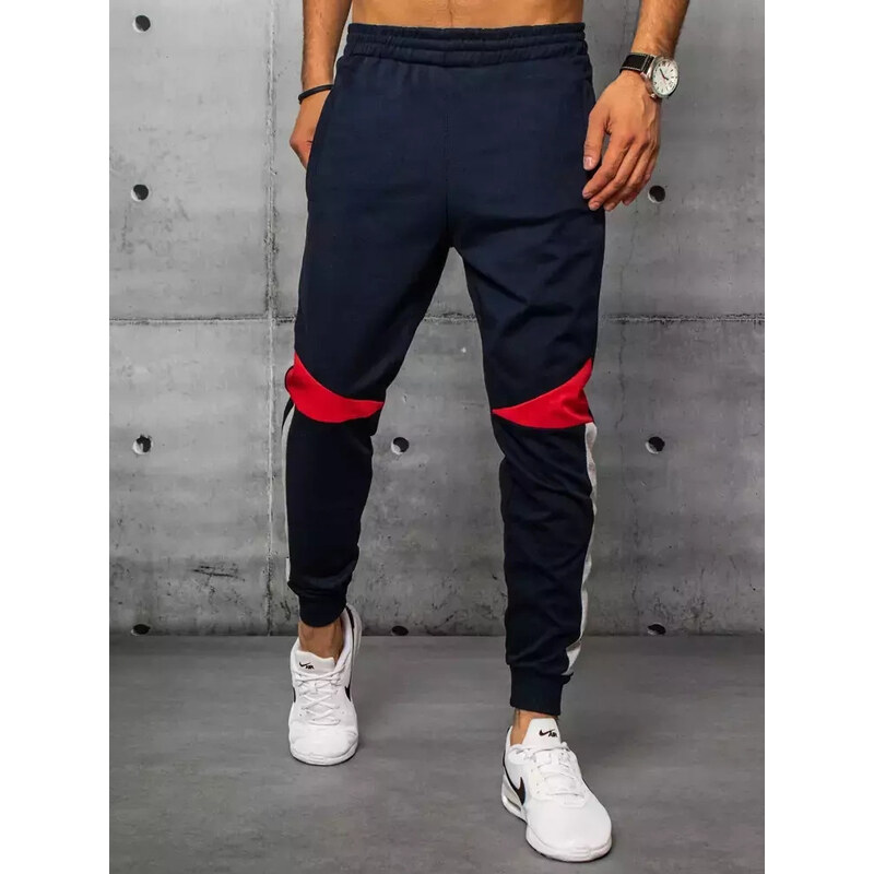 BASIC Tmavomodré pánske tepláky s červeným pruhom UX3240 36472272