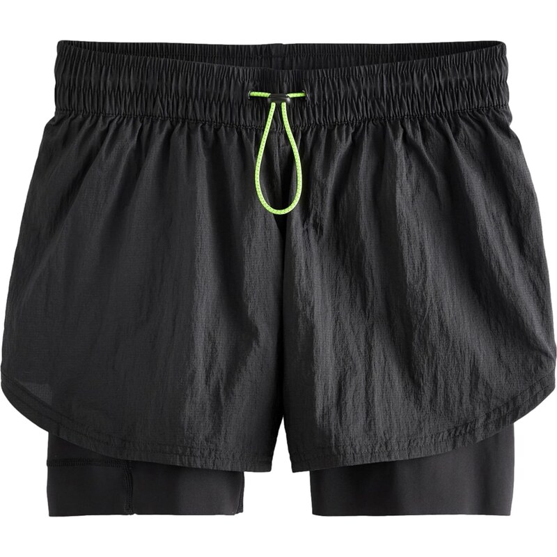 Next Športové nohavice neónovo zelená / čierna 63148319