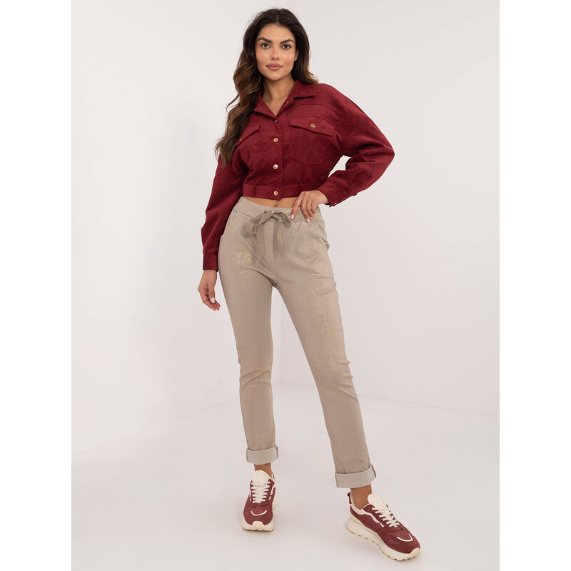 ITALY MODA Dámske smotanové lesklé nohavice so zaväzovaním v páse DHJ 66149281