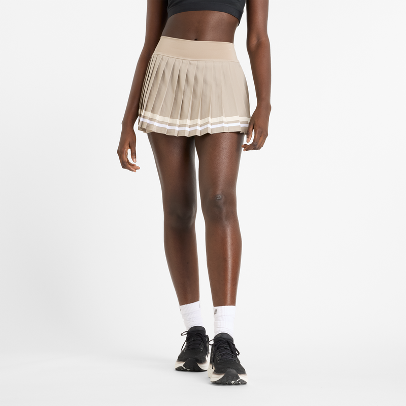 Dámska sukňa New Balance WK51402ADS – béžové 64125131