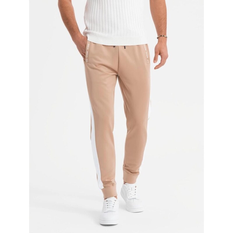 Ombre Clothing Pánske béžové tepláky s kontrastným lemovaním V4 PASK 63702460