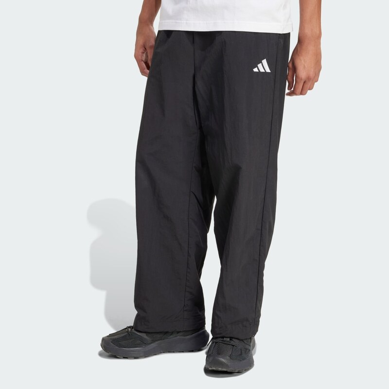 Základné tkané tepláky adidas smalým logom avoľným lemom 63900713