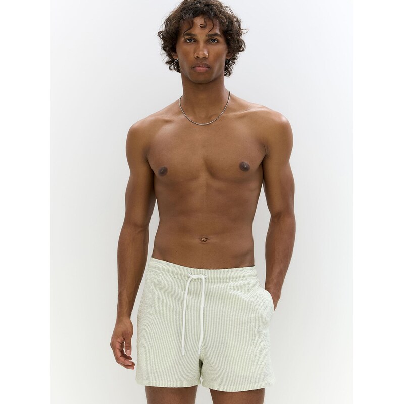 Pull&Bear Plavecké šortky pastelovo zelená / biela