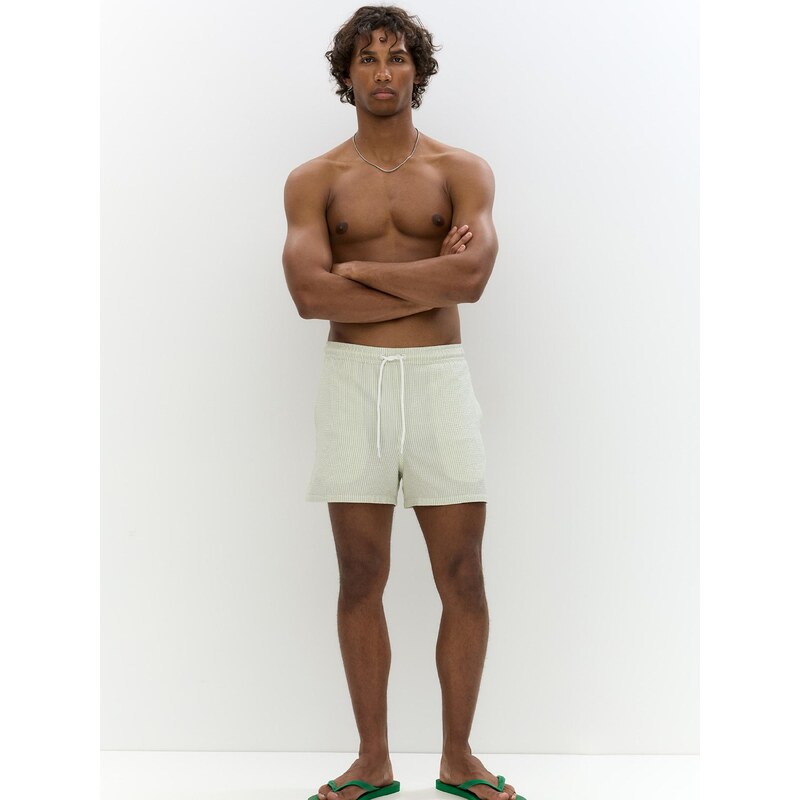 Pull&Bear Plavecké šortky pastelovo zelená / biela