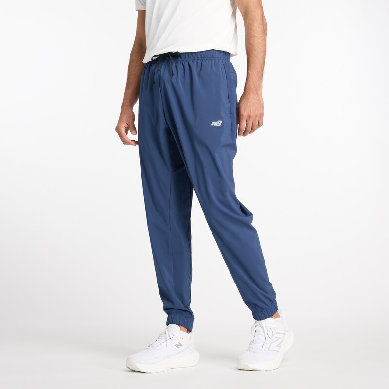 Pánske nohavice New Balance MP41011NNY – tmavomodrá 65231036