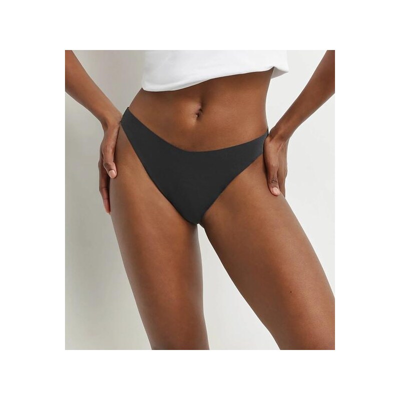 DIM INVISIBLE SEXY THONG - Dámske tangá - čierna 64678727