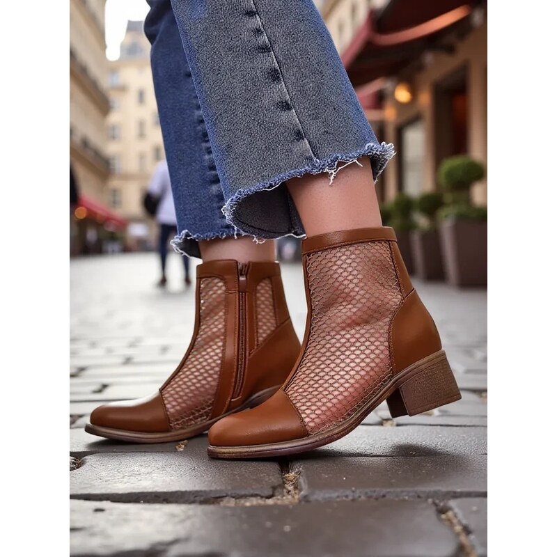 Resti Womens perforated ankle boots on a low heel Rowices 64965959