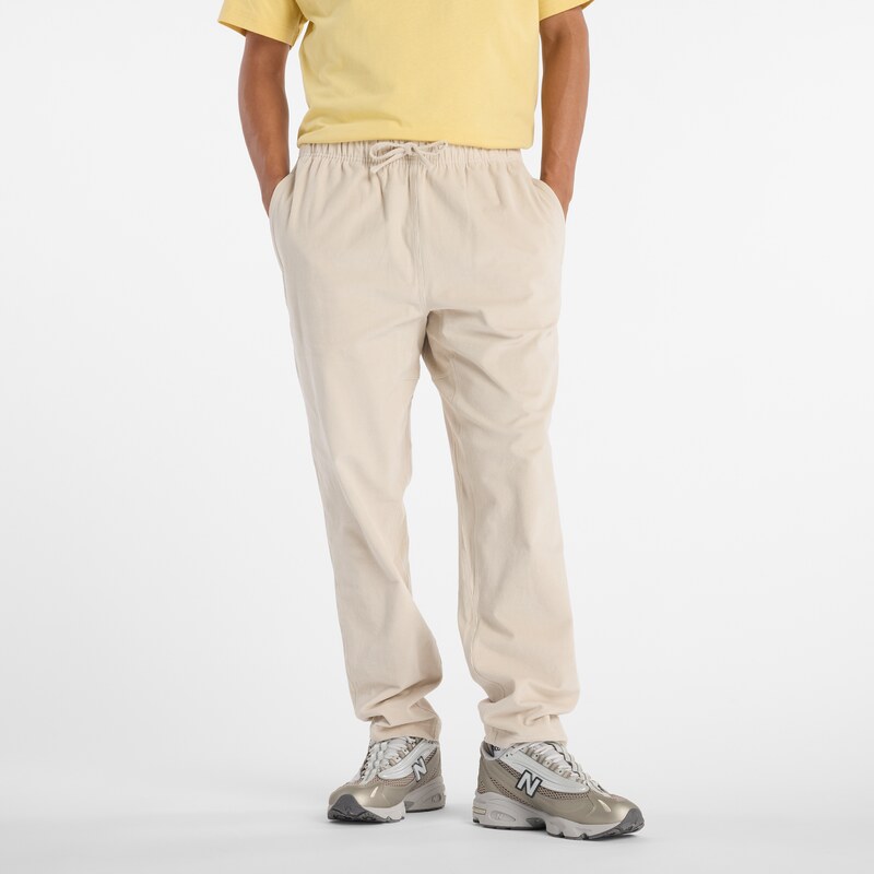 Pánske nohavice New Balance MP53521TWF – béžové 65442686