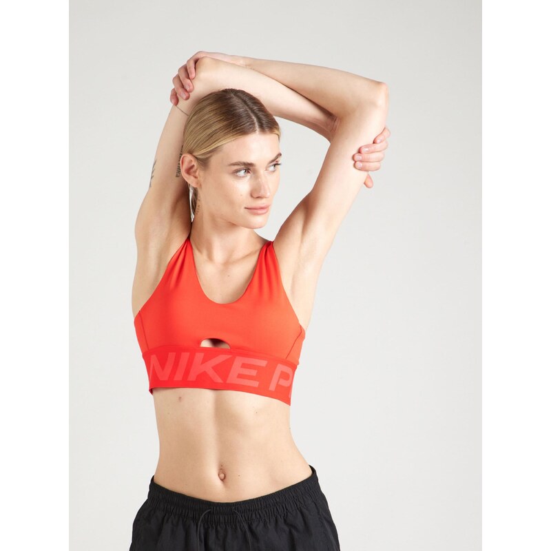 NIKE Športová podprsenka INDY PLUNGE oranžovo červená / biela 65906316