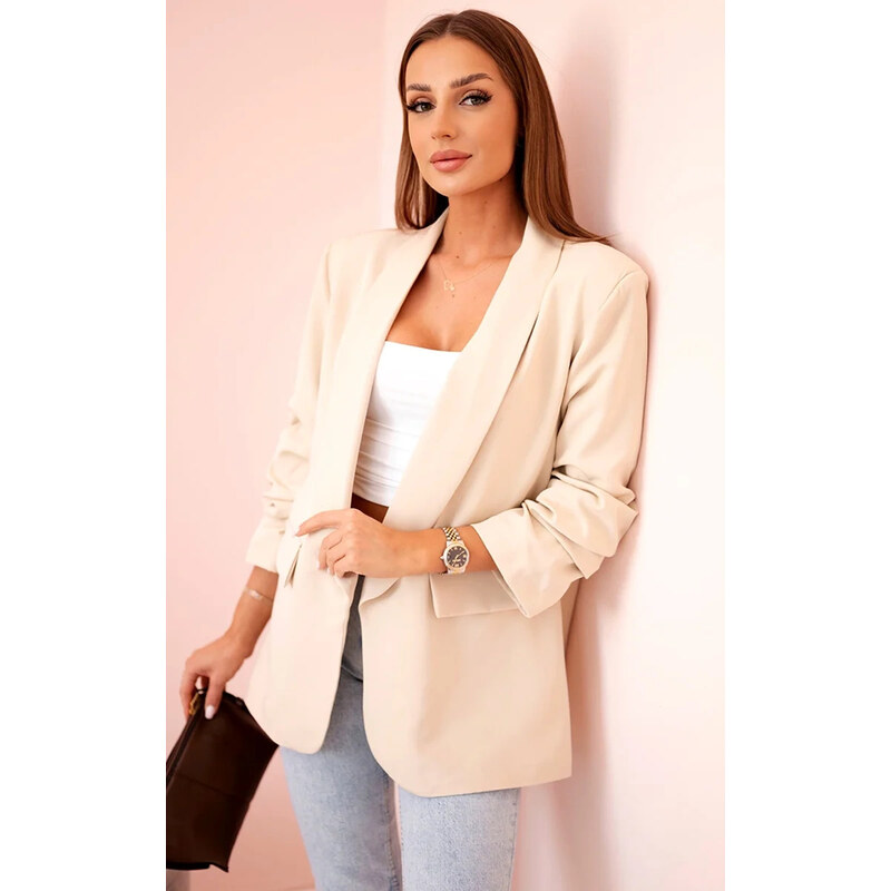 Kesi Elegantný dámsky smotanový blejzer bez zapínania 65607030