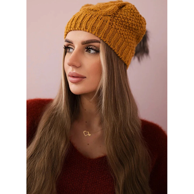 Kesi Horčicová dámska zimná čiapka s brmbolcom a fleecovou podšívkou 65675022