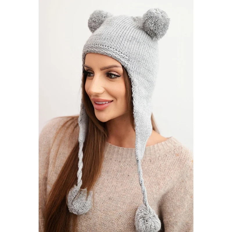 Kesi Dámska zimná čiapka s brmbolcami a uškami 66469297