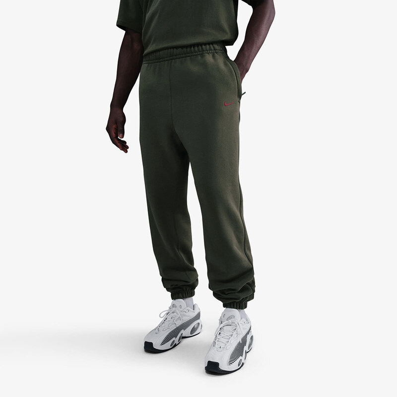 Tepláky Nike x NOCTA Fleece CS Sweatpants Cargo Khaki/ Team Red XXL 66531000