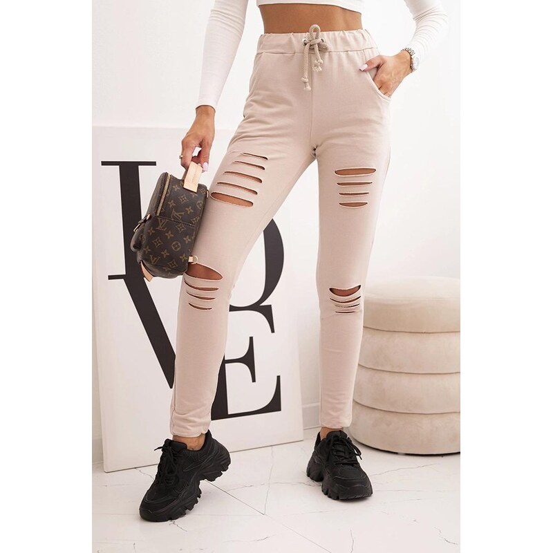 MladaModa Bavlnené nohavice v roztrhanom štýle a gumkou v páse model 66786685