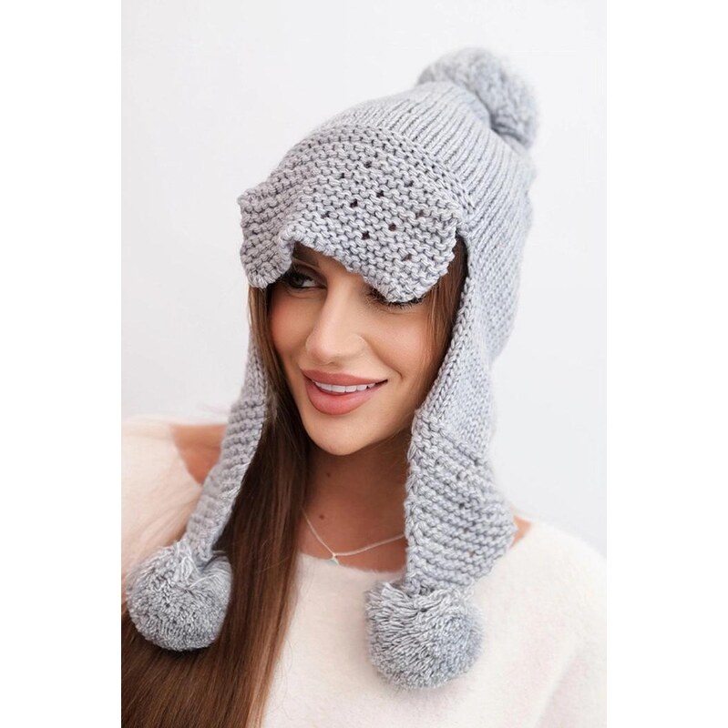 MladaModa Dámska čiapka s ušami, šiltom a brmbolcami model K475 svetlá 66891436