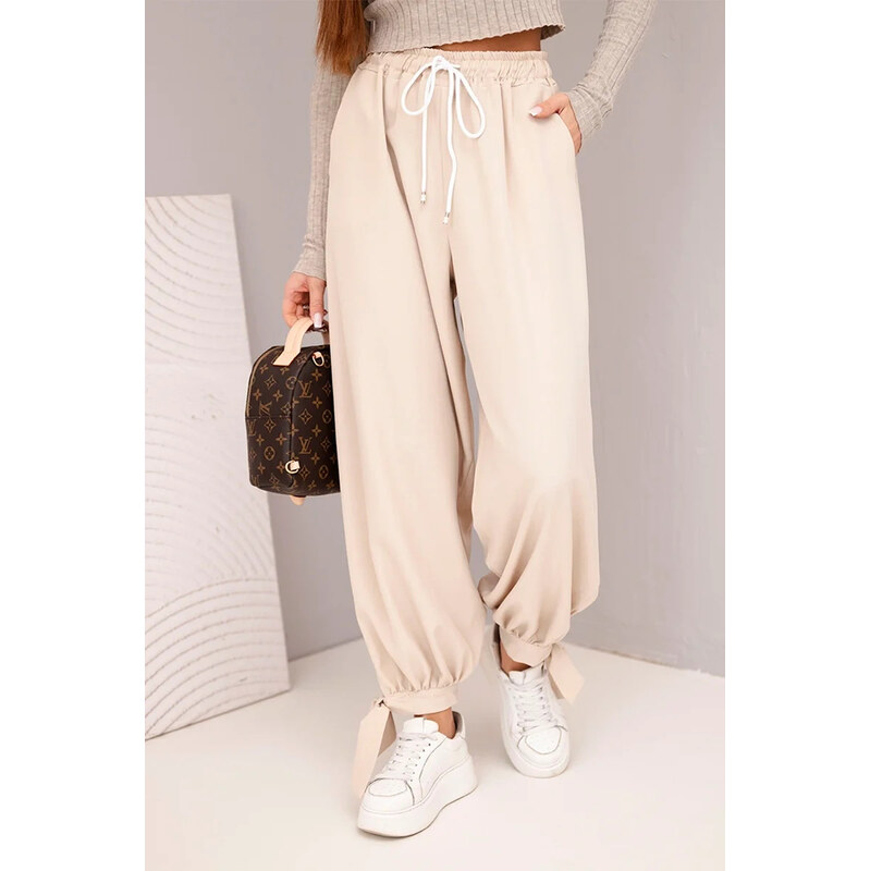 K-Fashion Dámske široké nohavice so zaväzovaním v spodnej časti béžové 67262780