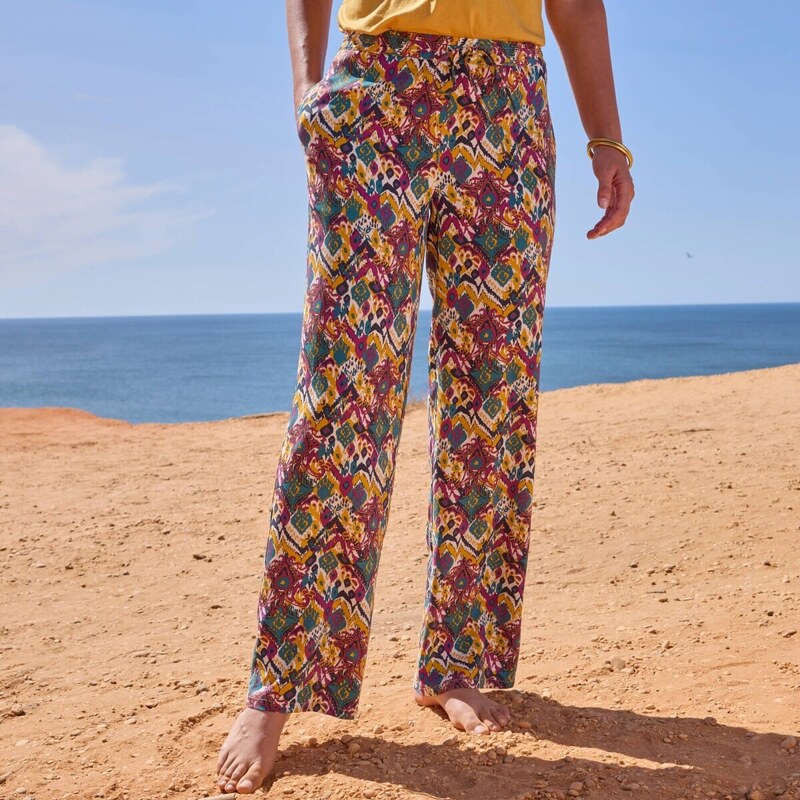 Široké nohavice s pružným pásom a potlačou purpurová/mangová 054 67452002