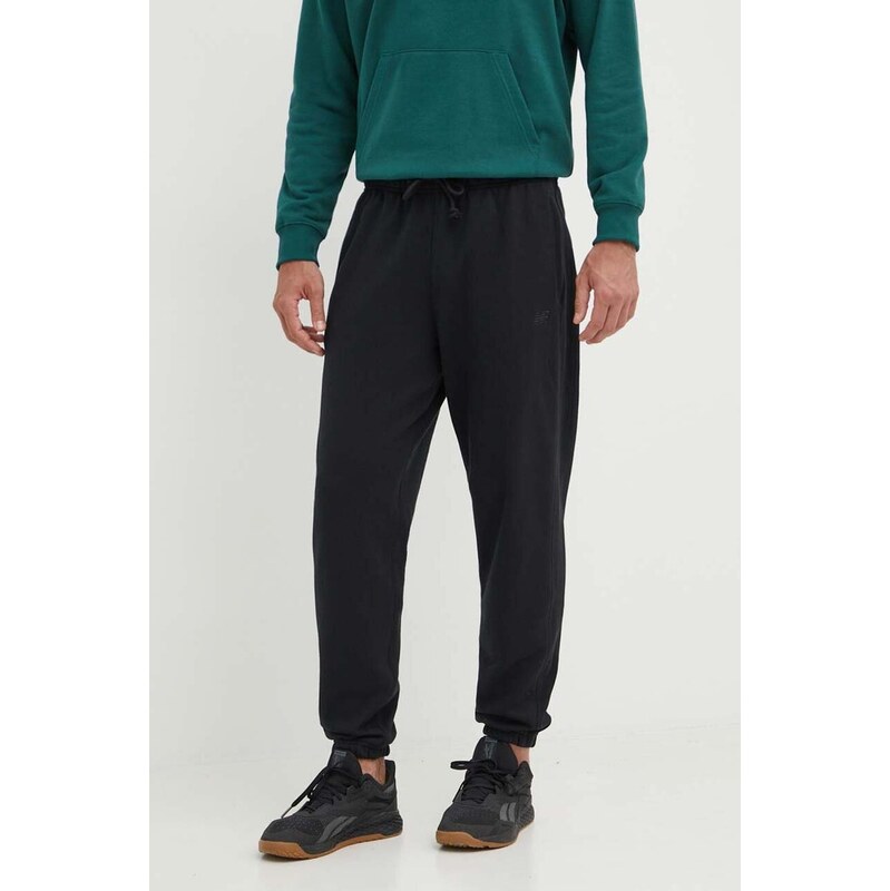 Bavlnené tepláky New Balance 52399280