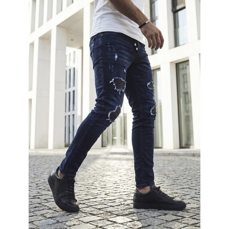 Dstreet Trendy tmavo modré rifle s módnymi odreninami 49236044