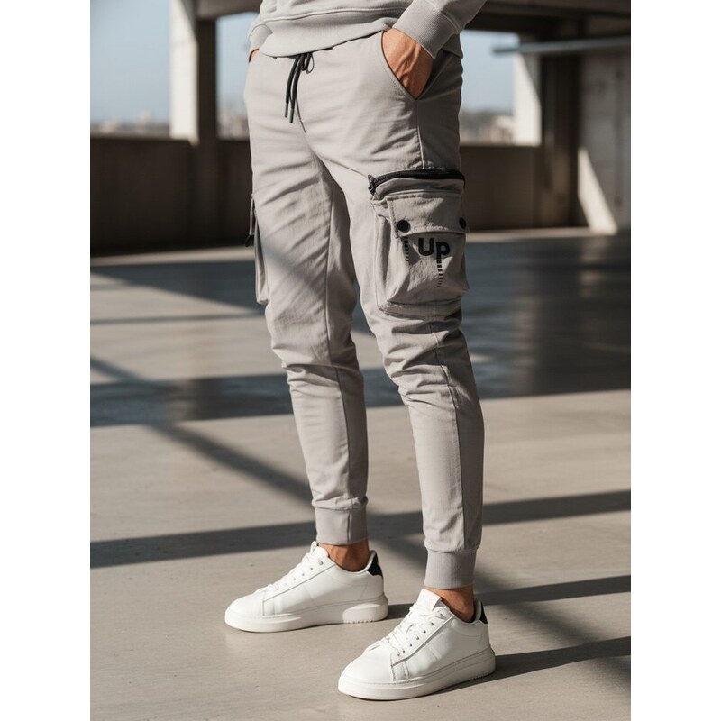 Dstreet Trendy šedé pánske kapsáčové joggery UP 49868511