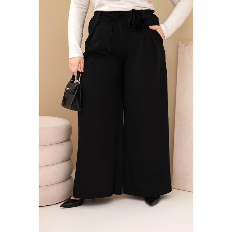 MladaModa Široké oversize nohavice s ozdobným kvetom v páse model 67714572