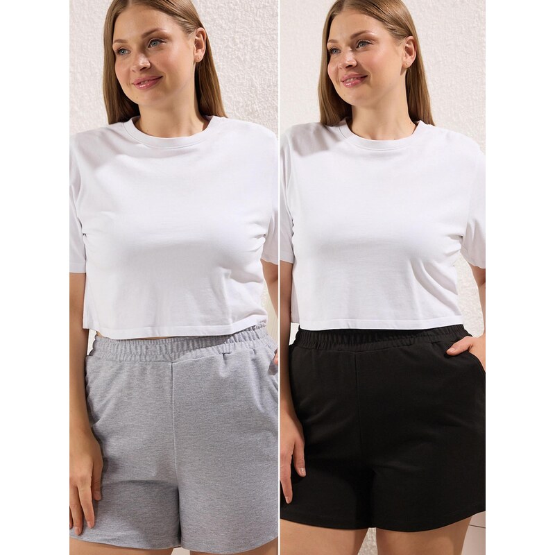 Trendyol Curve Nohavice sivá melírovaná / čierna 68398569