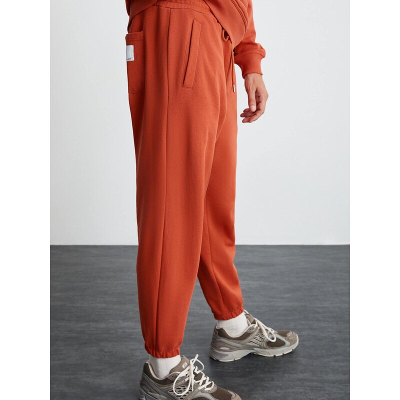 Grimelange Nohavice oranžovo červená 68501293