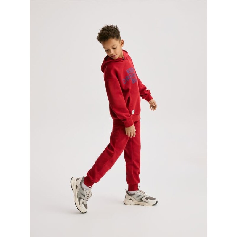 Reserved - Bavlnené jogger nohavice - červená 68513702