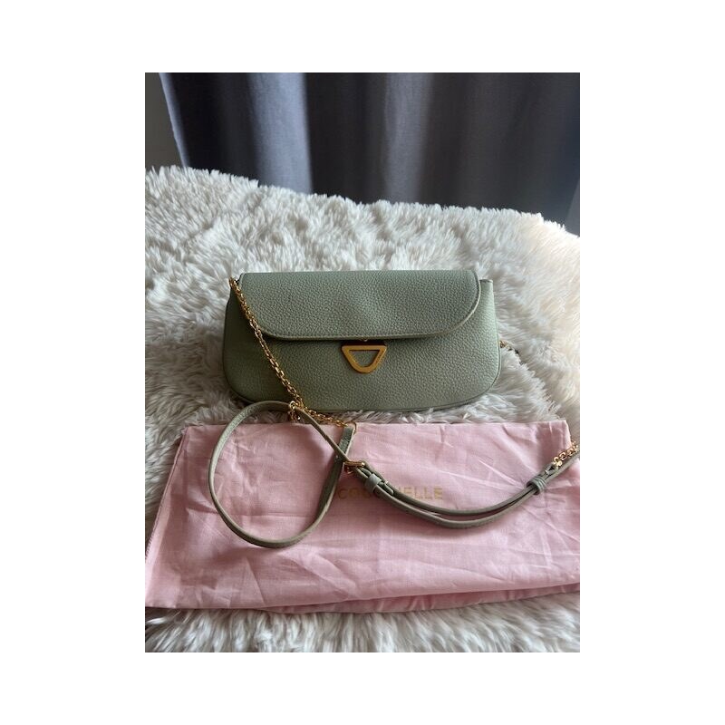 Dámska kabelka Coccinelle green cross 68753508