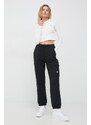 Bavlnené tepláky Calvin Klein Jeans dámske, čierna farba, jednofarebné