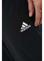 Tréningové nohavice adidas Essentials Stanford čierna farba, s nášivkou