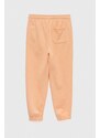 Detské tepláky Calvin Klein Jeans oranžová farba, jednofarebné