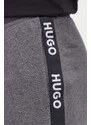 Bavlnené nohavice HUGO šedá farba,s nášivkou,50496995