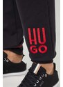 Bavlnené nohavice HUGO čierna farba, s nášivkou, 50510541
