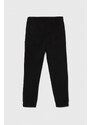 Detské tepláky Calvin Klein Jeans čierna farba, s nášivkou