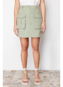 Trendyol Collection Mint Premium tkaná mini sukňa s detailom vrecka