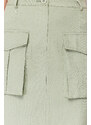 Trendyol Collection Mint Premium tkaná mini sukňa s detailom vrecka